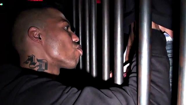 Blindfolded stud in cage fucks black ass after getting sucked