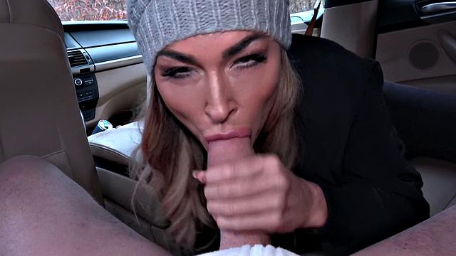 A busty MILF with huge tits suck and fuck in a car fantasy