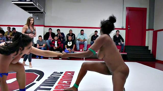 Wrestling lez winners facesit losers in public orgy