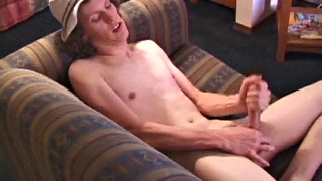 RJ Davis is a 21 year old Texas native who wants to show the world what unique talents he has to offer. Lying naked on the sofa, he starts to rub his cock before getting down with a purple dildo, which he loves.