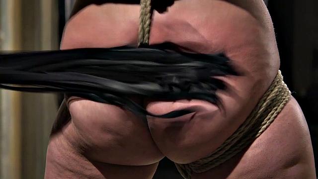 Curvy bondage whipped by dom during punishment