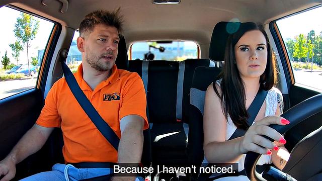 Inked babe pleasing instructor to pass driving test