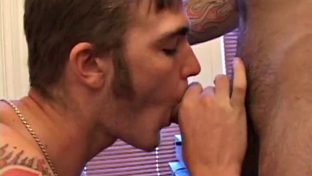 While watching a porn video on the TV, Rock and Christian swap spit and get naked. Rock goes down on Christian nad sucks his cock hard. After Christian reciprocates, they 69 on the floor.