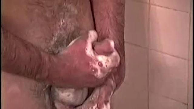 After staying the night and fucking me, I asked my friend Henry if I could film him in the bath tub shooting another load. He said sure, so here it is.
