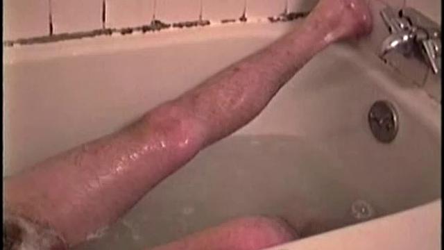 After staying the night and fucking me, I asked my friend Henry if I could film him in the bath tub shooting another load. He said sure, so here it is.