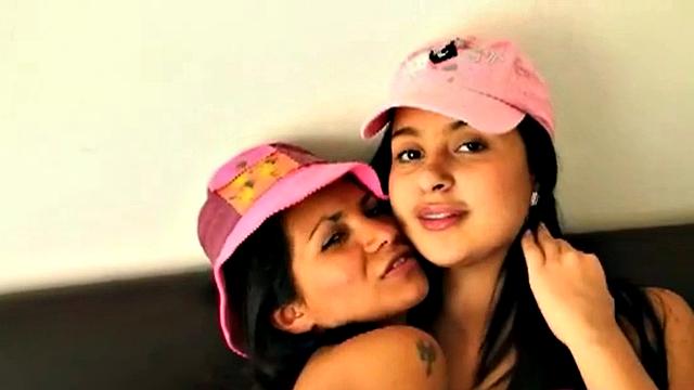 Watch Lilly and her horny lesbian friend Kiss and Lick each other's bald pussies in socks and shorts