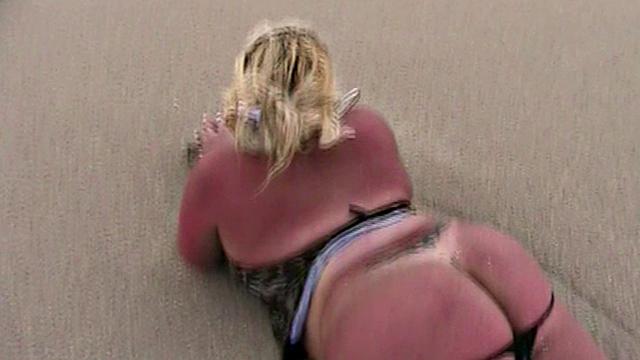 Monica Richard Flashing on the Beach