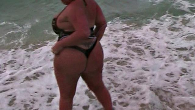 Monica Richard Flashing on the Beach