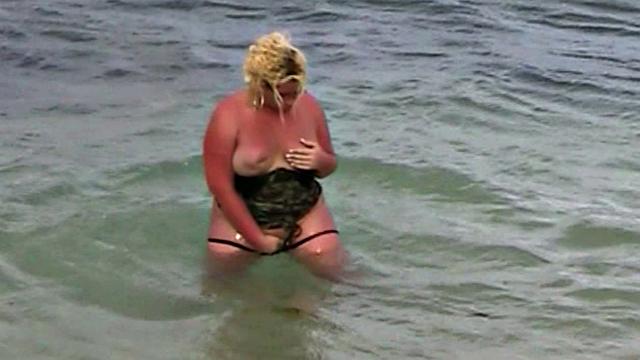 Monica Richard Flashing on the Beach