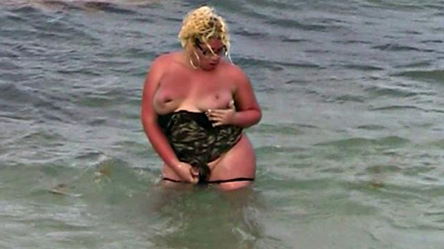 Monica Richard Flashing on the Beach