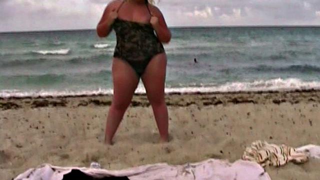 Monica Richard Flashing on the Beach