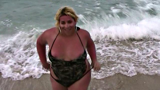 Monica Richard Flashing on the Beach