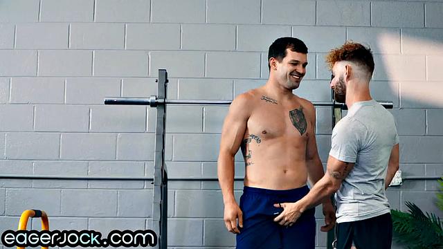 Muscle guy doggy-fucked by gym dude