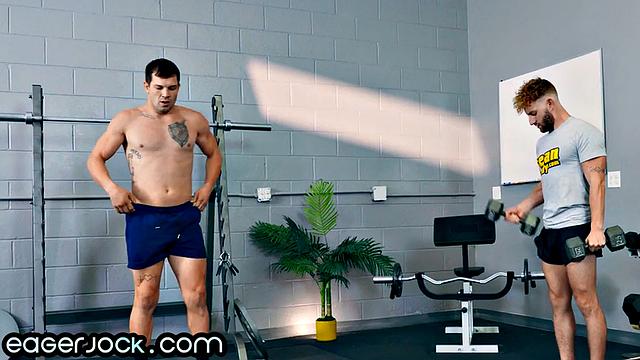 Muscle guy doggy-fucked by gym dude