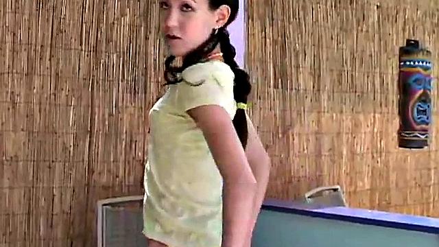 Petite brunette masturbates solo