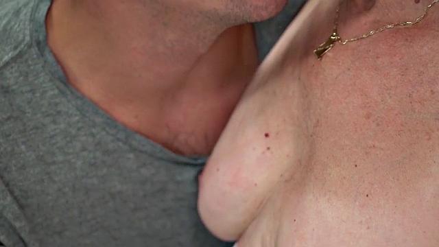 Redhead granny gets fucked in hairypussy by younger lover