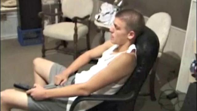 Young Lance has a very inviting and sexy look, as he stares into the camera, while massaging his hard cock. We enjoy a nice long stroke from this naked boy, before he blows his load over a chair.