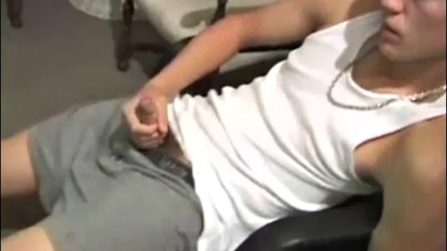 Young Lance has a very inviting and sexy look, as he stares into the camera, while massaging his hard cock. We enjoy a nice long stroke from this naked boy, before he blows his load over a chair.