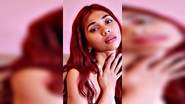 Redhead in Pink Outfit