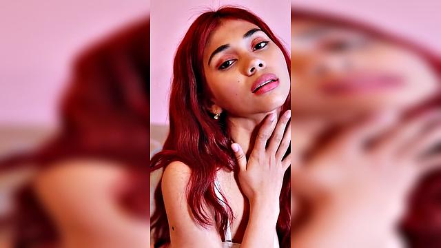 Redhead in Pink Outfit