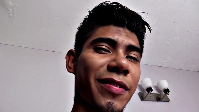 Latin boy Sebastian slowly strips to underwear, pulls out big stiff cock, plays, gets naked, beats off standing