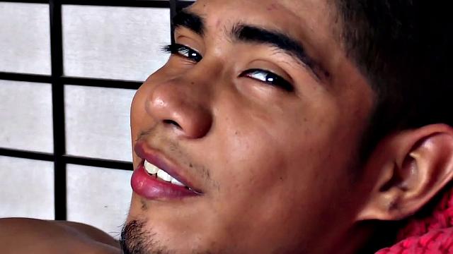 Latin boy Sebastian slowly strips to underwear, pulls out big stiff cock, plays, gets naked, beats off standing