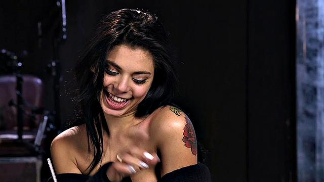 Restrained babe toyed while being tied up upside down