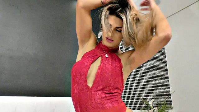 Sultry Shemale Janaina Carvalho Undresses and Plays with a Dildo