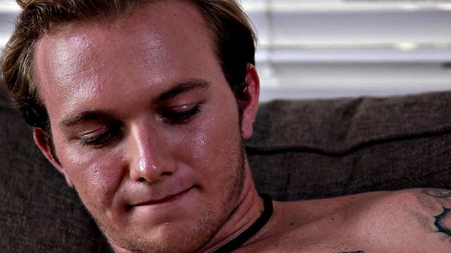 Watch this tattooed newcomer tugging his unshaved shaft in solo playtime