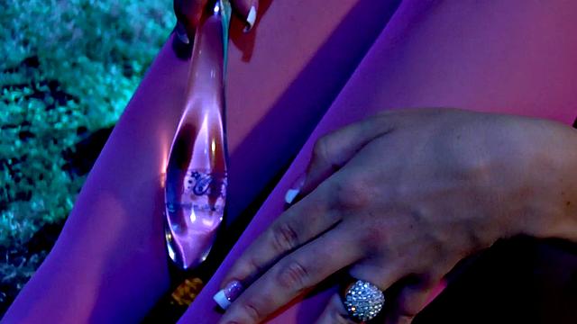 Watch this curvy babe in leggings toy her wet pussy with a dildo up close and personal
