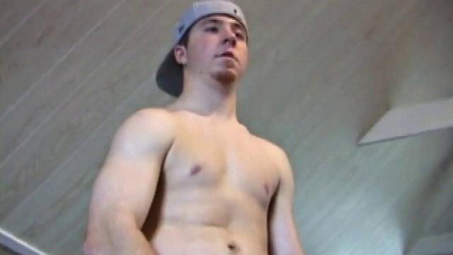 Cory Woodall watches a porn video near his skateboard. The camera takes us on a tour of Cory's body, which looks cuter than ever. When viewed from the floor up, this boy's balls are huge.