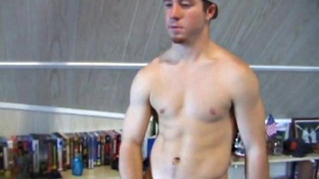 Cory Woodall watches a porn video near his skateboard. The camera takes us on a tour of Cory's body, which looks cuter than ever. When viewed from the floor up, this boy's balls are huge.