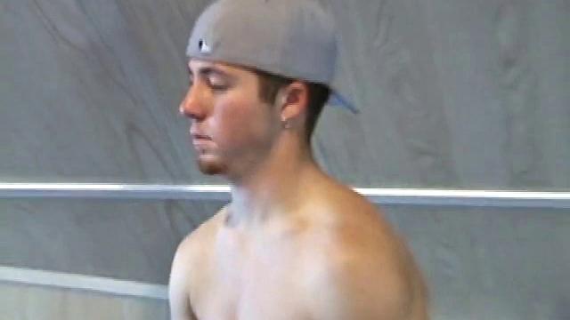 Cory Woodall watches a porn video near his skateboard. The camera takes us on a tour of Cory's body, which looks cuter than ever. When viewed from the floor up, this boy's balls are huge.