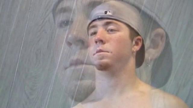 Cory Woodall watches a porn video near his skateboard. The camera takes us on a tour of Cory's body, which looks cuter than ever. When viewed from the floor up, this boy's balls are huge.