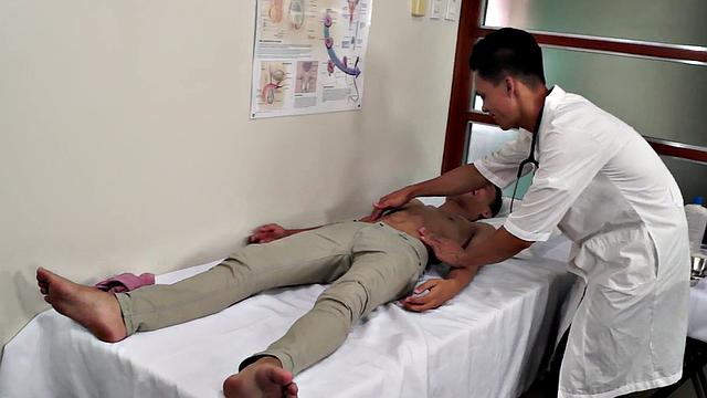 Asian twink fingered and sucked by doctor in the infirmary