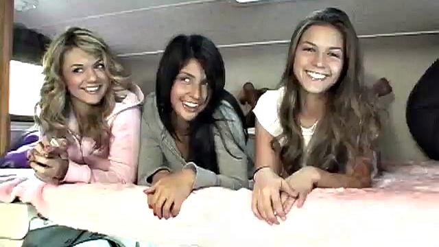 Sexy petite lesbians teasing the camera in close up