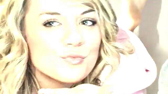 Sexy petite lesbians teasing the camera in close up