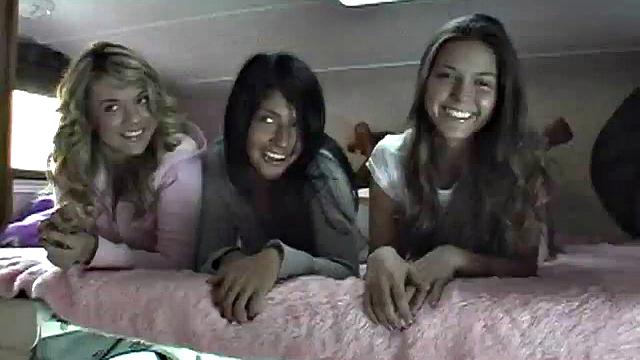 Sexy petite lesbians teasing the camera in close up