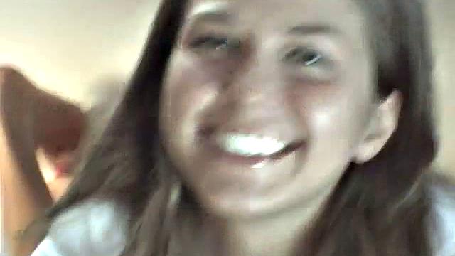 Sexy petite lesbians teasing the camera in close up