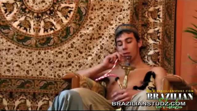 We look in on Nabih Sirajh, watching young Yazid Aban toke on a hookah. After a quick smoke himself, Nabih can't seem to keep his hand off his crotch. The meat that Yazid eventually pulls out of Nabih's pants is a monster.