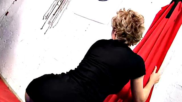 MILF babe Leila teases the camera