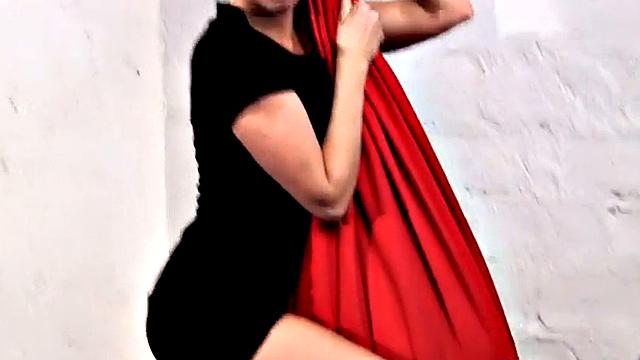 MILF babe Leila teases the camera