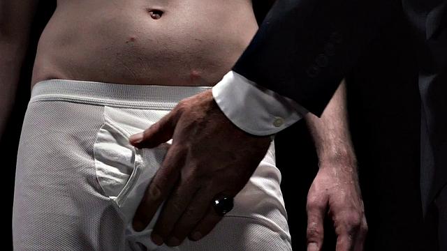 Religious master inspects apprentice