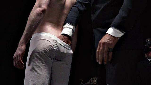 Religious master inspects apprentice