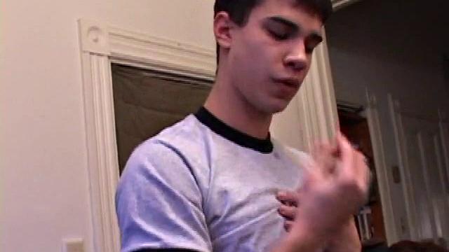 After unbuckling his jeans, Dawson slips off and out his stiff dick. He strokes it as he watches some porn.