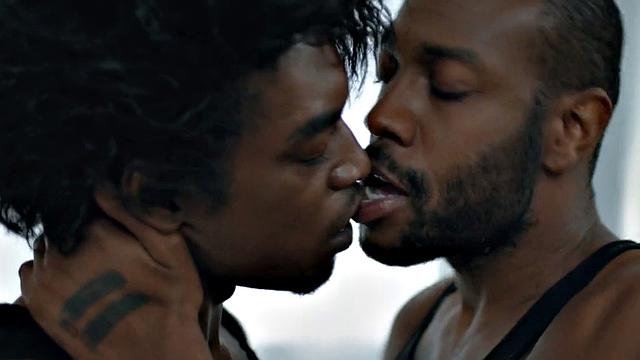 Muscular Jock pounding tattooed black stud on bed