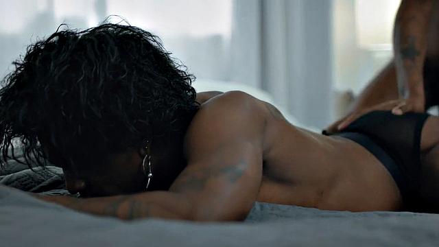 Muscular Jock pounding tattooed black stud on bed