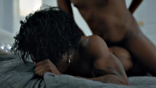 Muscular Jock pounding tattooed black stud on bed