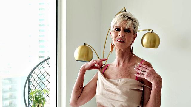 Meet Foxxxy, a 60-year-old MILF and GILF with big tits and a pierced clit