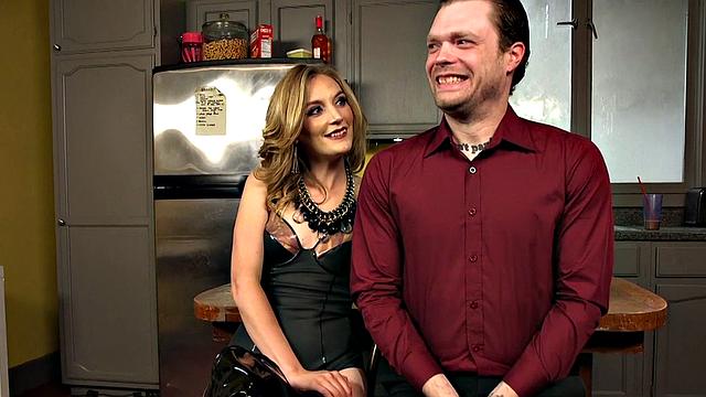 Leather domme humiliates subject in kitchen session